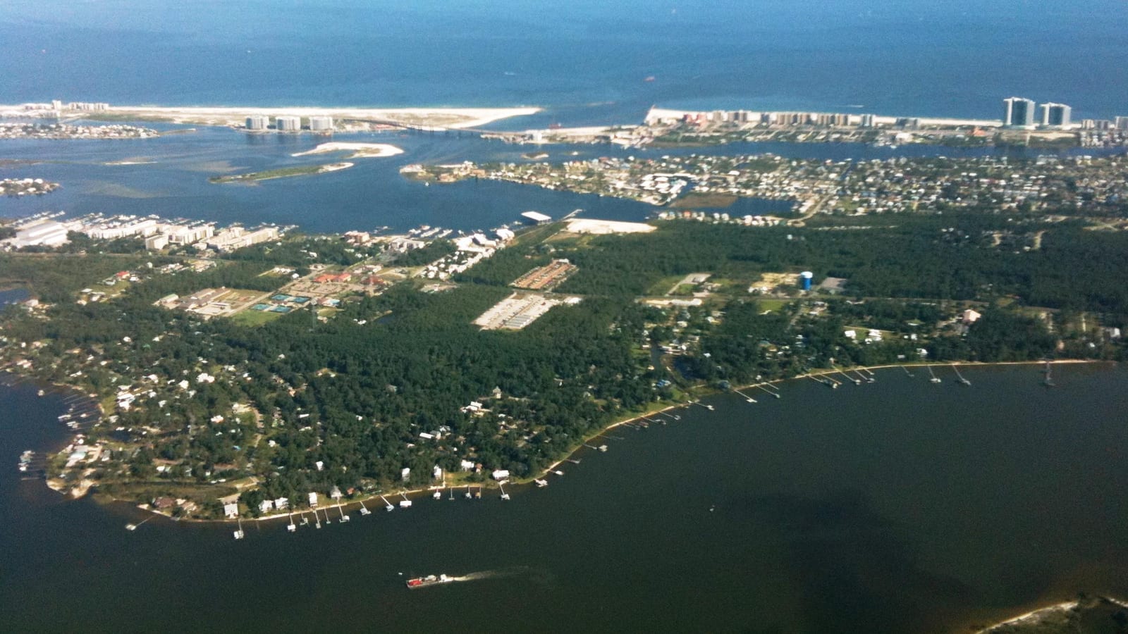 Archival aerial view of Perdido Key and its surrounding waterfront, photographed by Curtis Palmer in 2010